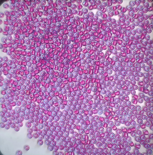 ROUND 11/0 980 TRANSPARENT FUCSIA INSIDE