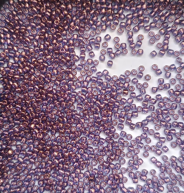 ROUND 11/0 201 TRANSPARENT PURPLE GOLD